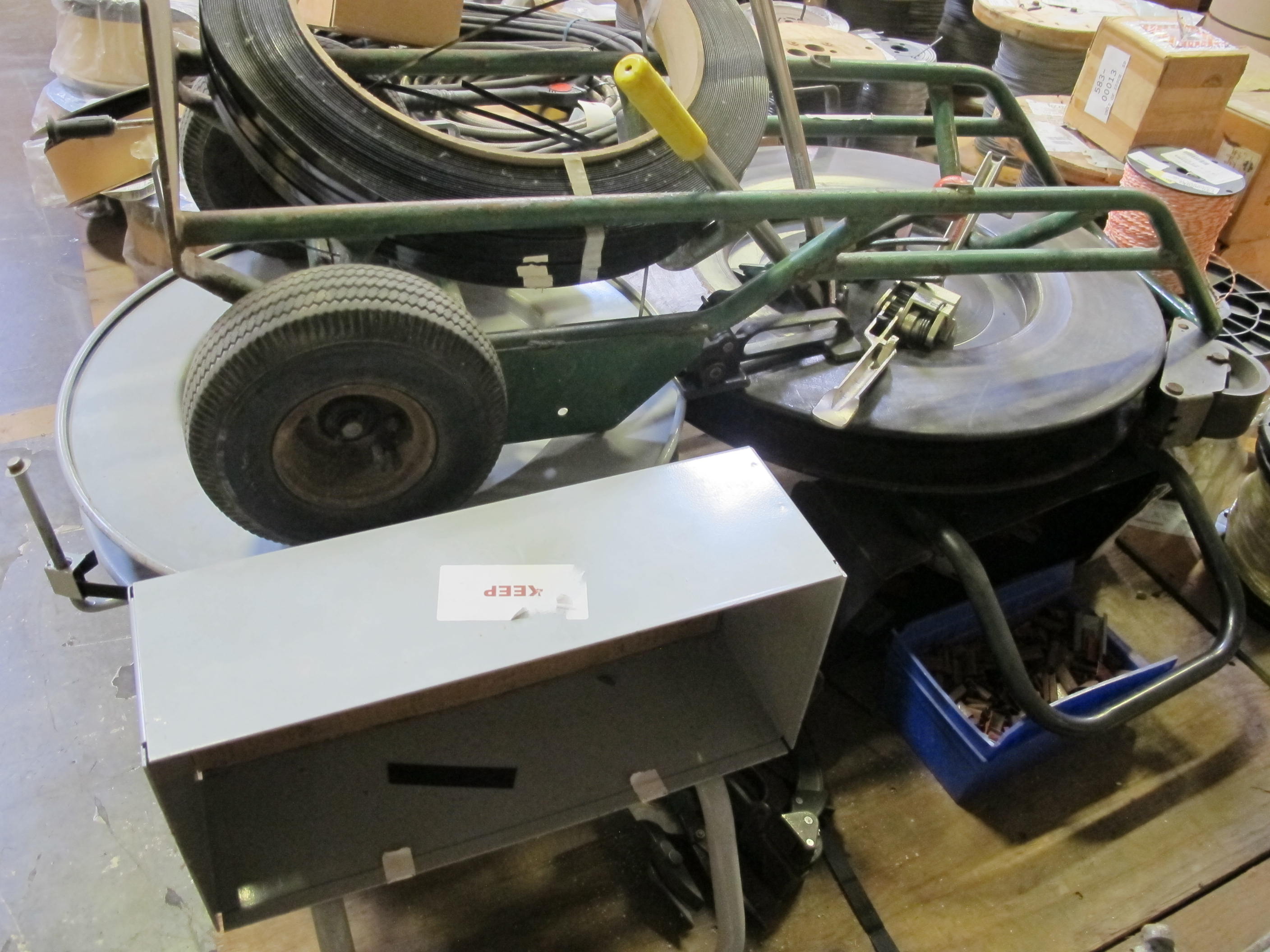 LOT TO INCLUDE: (2) BANDING MACHINES, (1) MOVING DOLLY. LOADING & HANDLING FEE $15-4072